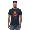 A man wearing a navy blue Iron Man Superhero Illustration Tee featuring a bold red and gold armor graphic with a glowing arc reactor.
