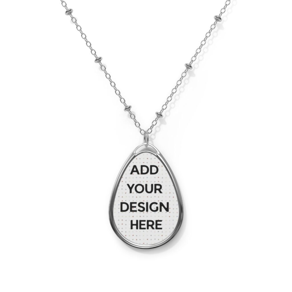 A silver Custom Oval Pendant Necklace featuring a beaded chain and a teardrop-shaped pendant with a white placeholder reading "ADD YOUR DESIGN HERE."